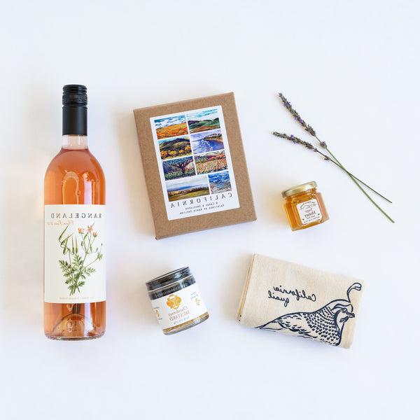 Flora Rosé California Gift flat lay of CA products with sprigs of lavender