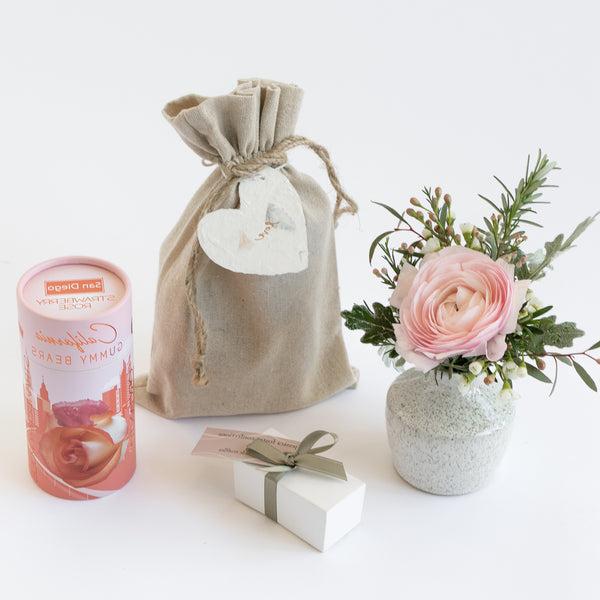 Love Bud Vase bundle with locally grown flower stem, chocolate truffles and gummy bears in a linen pouch